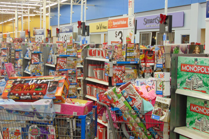 Joy of Giving Carts Over Filled With Toys | The Joy of Giving supports families in need in Collier County